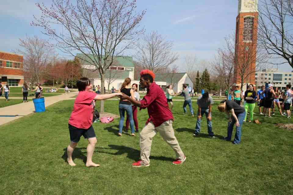 Students dancing on the Kirkhof lawn